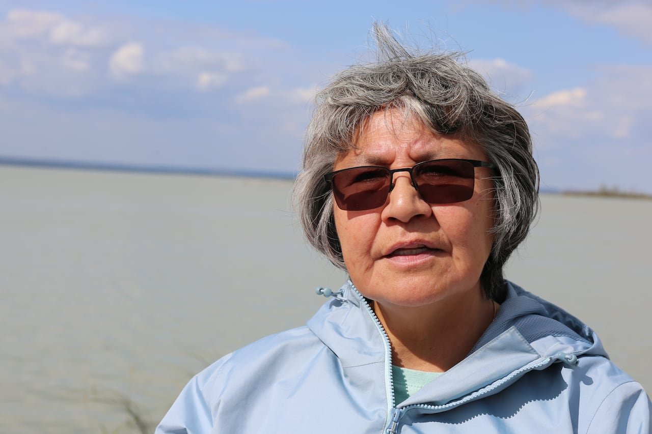 A woman wearing sunglasses outdoors